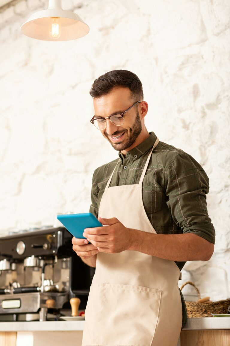 Businessman is smiling while enjoying working process